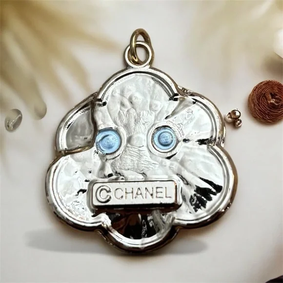 CHANEL White and Gold Camellia Charm - Picture 2 of 3